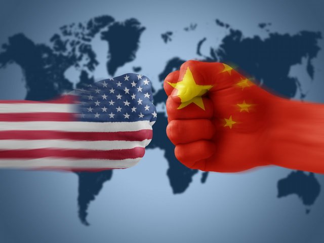 «جنگ تجاری چین و آمریکا اقتصاد جهان را مورد تهدید قرار داده است»